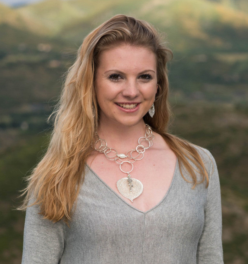 Signature Silver chain combined with a large Silver leaf and crystal dangles creates this striking necklace